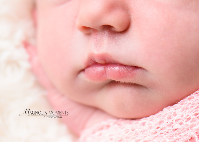 Close-up newborn baby pic showing detail of lips as part of a newborn photoshoot at one of the photography studios near me Phoenixville newborn photographer