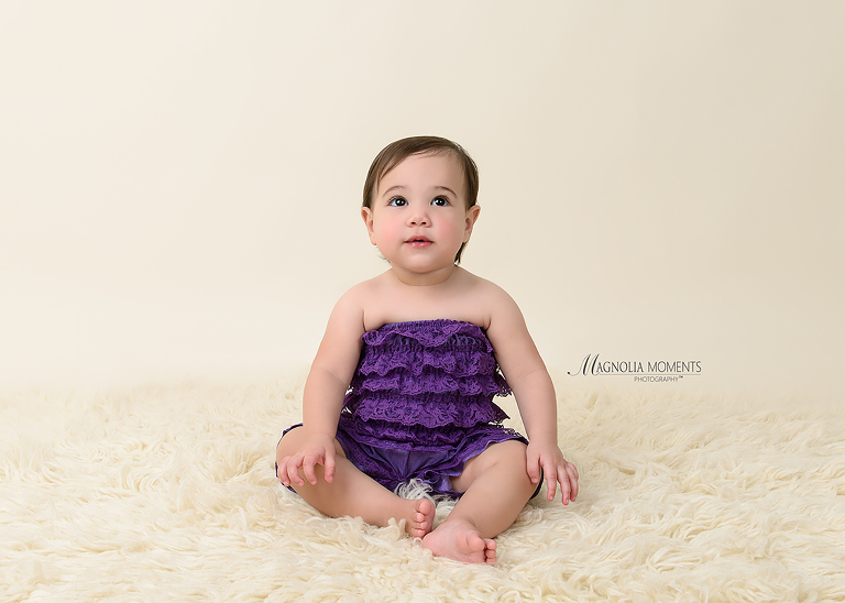 Philadelphia birthday girl in purple taken by Evan Pollock of Magnolia Moments Photography who does Cake Smash photography near me
